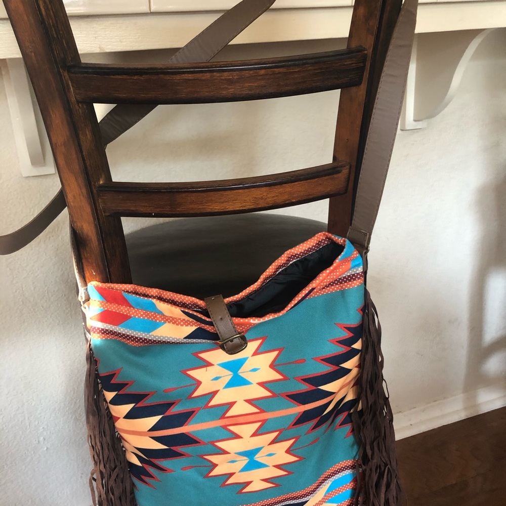 Aztec style purse with fringe.